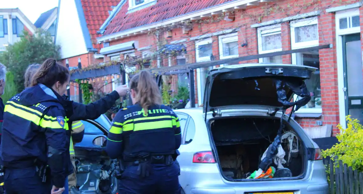 Binnenkant auto zwart door brand - Foto 1