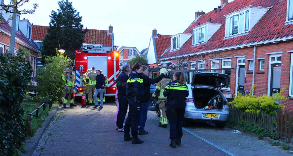 Binnenkant auto zwart door brand - Foto 2