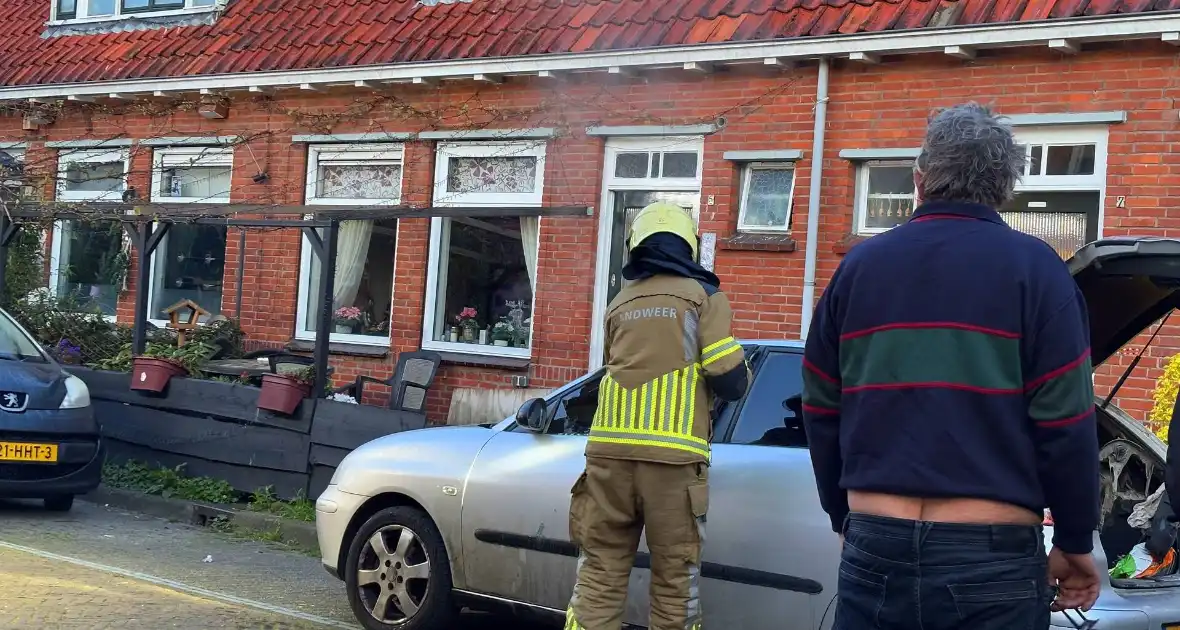 Binnenkant auto zwart door brand - Foto 3