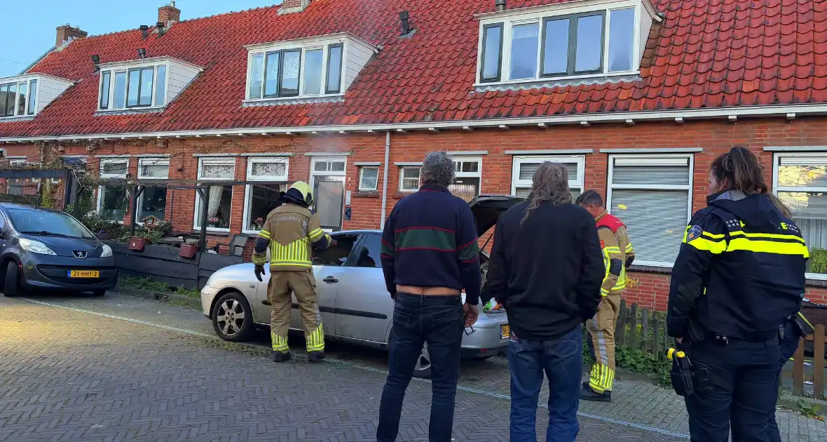 Binnenkant auto zwart door brand - Foto 4