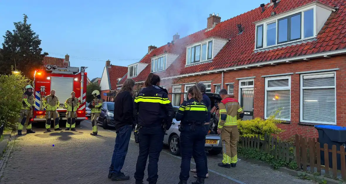 Binnenkant auto zwart door brand - Foto 5