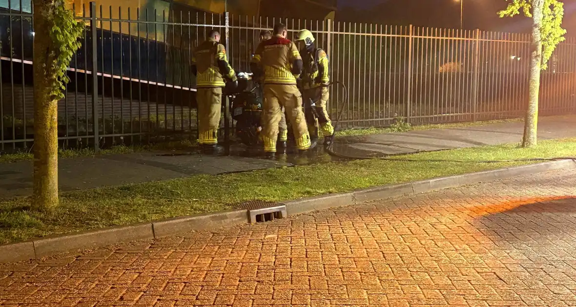 Brand in koffer van scooter - Foto 1