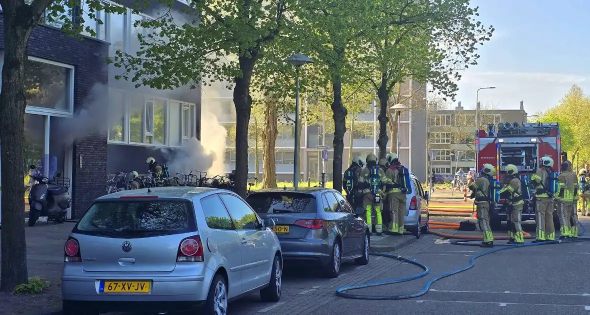 Forse rookontwikkeling bij grote flatbrand - Foto 3
