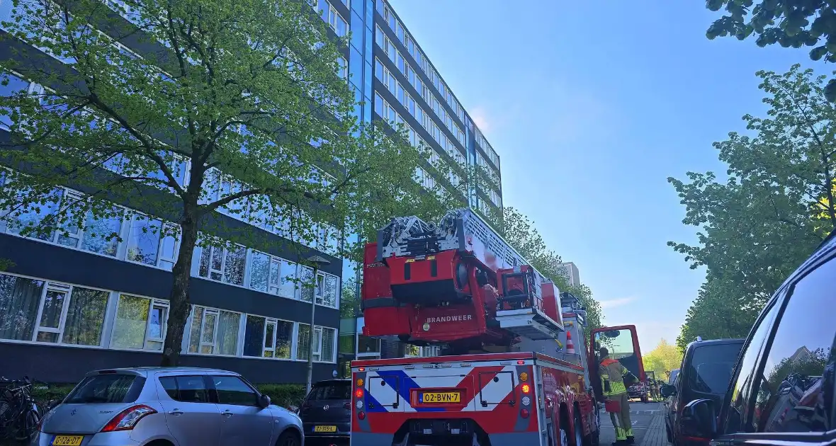 Forse rookontwikkeling bij grote flatbrand - Foto 7