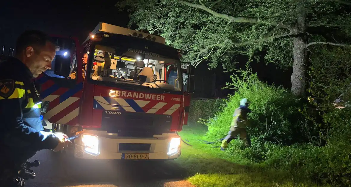 Vuurkorf zorgt voor brand in achtertuin - Foto 2