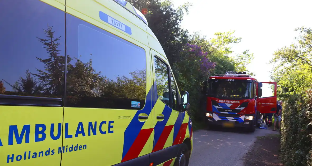 Man komt vast te zitten met voet in vlonder - Foto 2