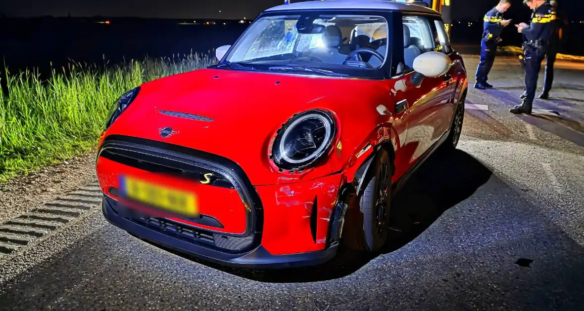 Scooter botst frontaal op auto - Foto 4