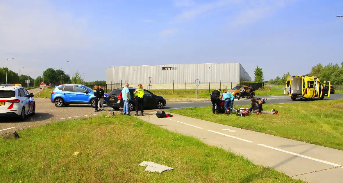 Twee gewonden na botsing met scooter