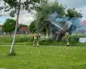 Brandende boom snel gedoofd
