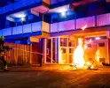 Scooter in brand gestoken achter flat