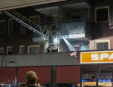 Brand op balkon op eerste verdieping