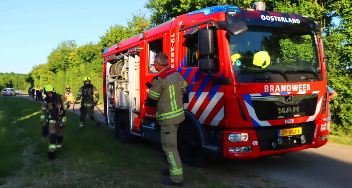 Bomen en pipowagen in brand - Foto 6