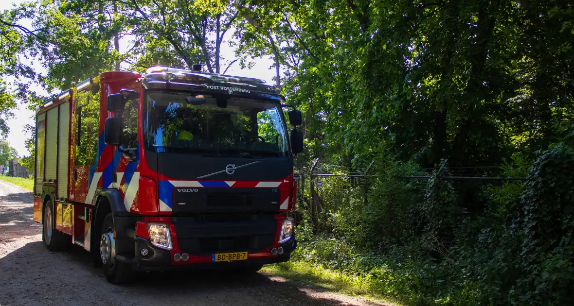 Brandweer in actie na melding van brand - Foto 2