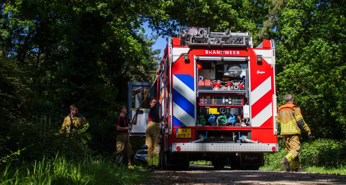 Brandweer in actie na melding van brand - Foto 3