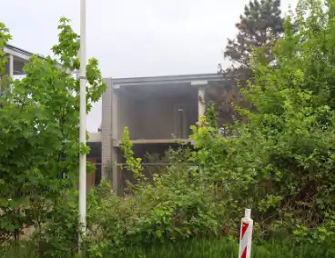 Brandweer blust brand in slooppand