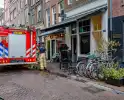 Brand in restaurant door grilloven