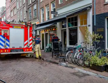 Brand in restaurant door grilloven