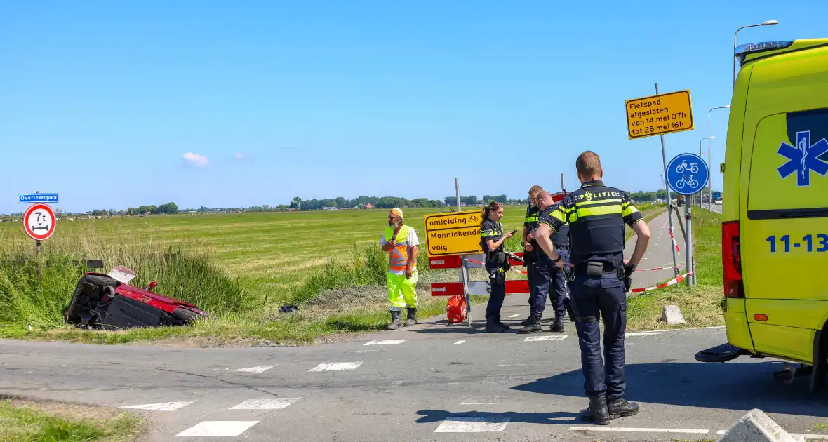 Invalidenauto raakt te water na ongeval - Foto 3
