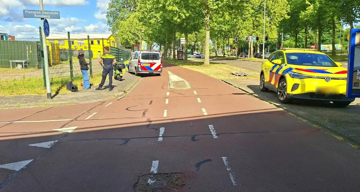 Verkeersongeluk tussen fietser en scooterrijder