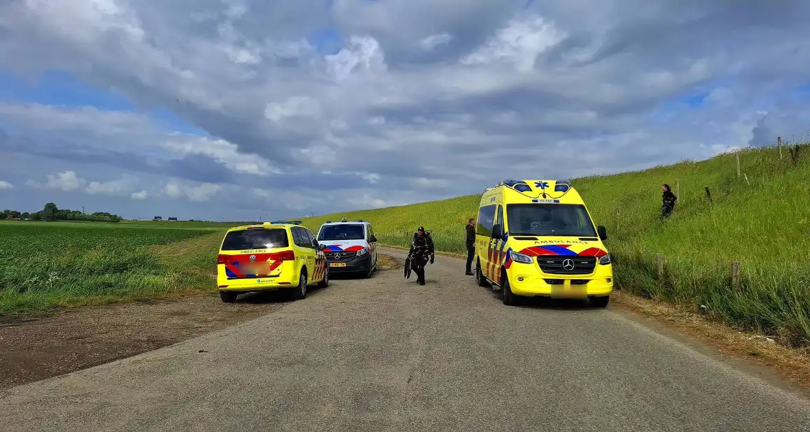 Persoon in nood bij duiklocatie - Foto 1