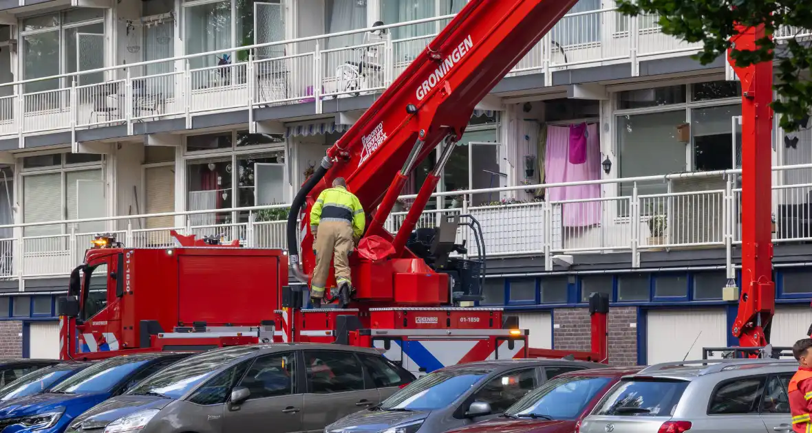 Brandweer druk met grote brand in flatwoning - Foto 2