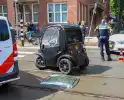 Aanrijding tussen brommobiel en auto met gewonde