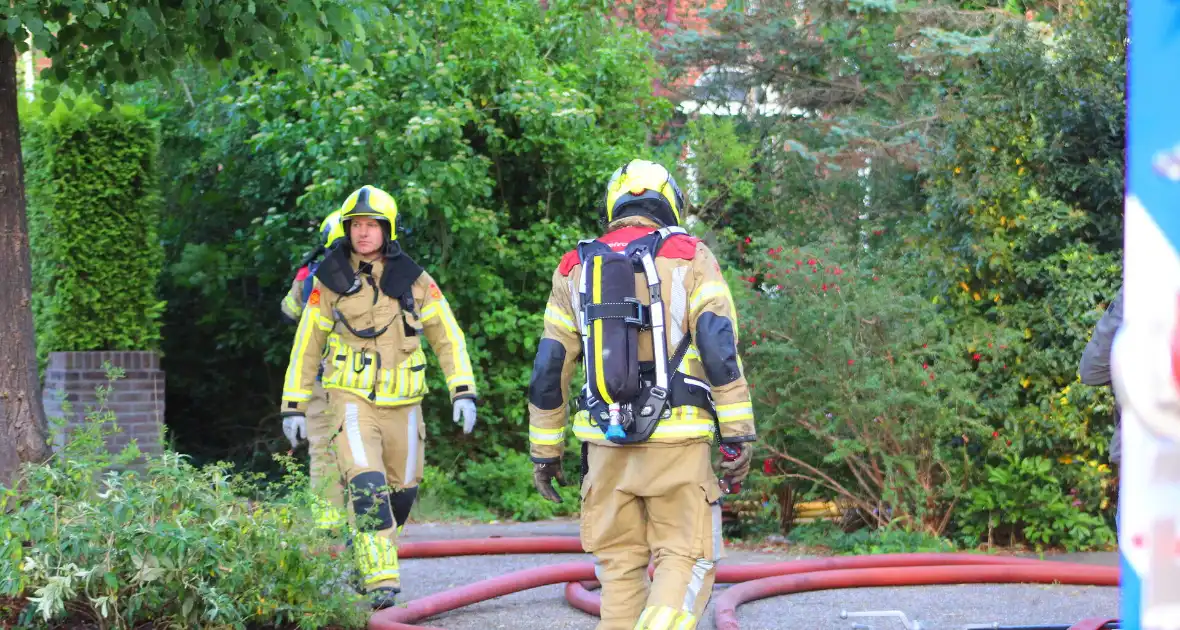 Gewonde bij uitslaande woningbrand - Foto 1