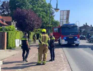 Brandweer ingezet voor brand achter een woning