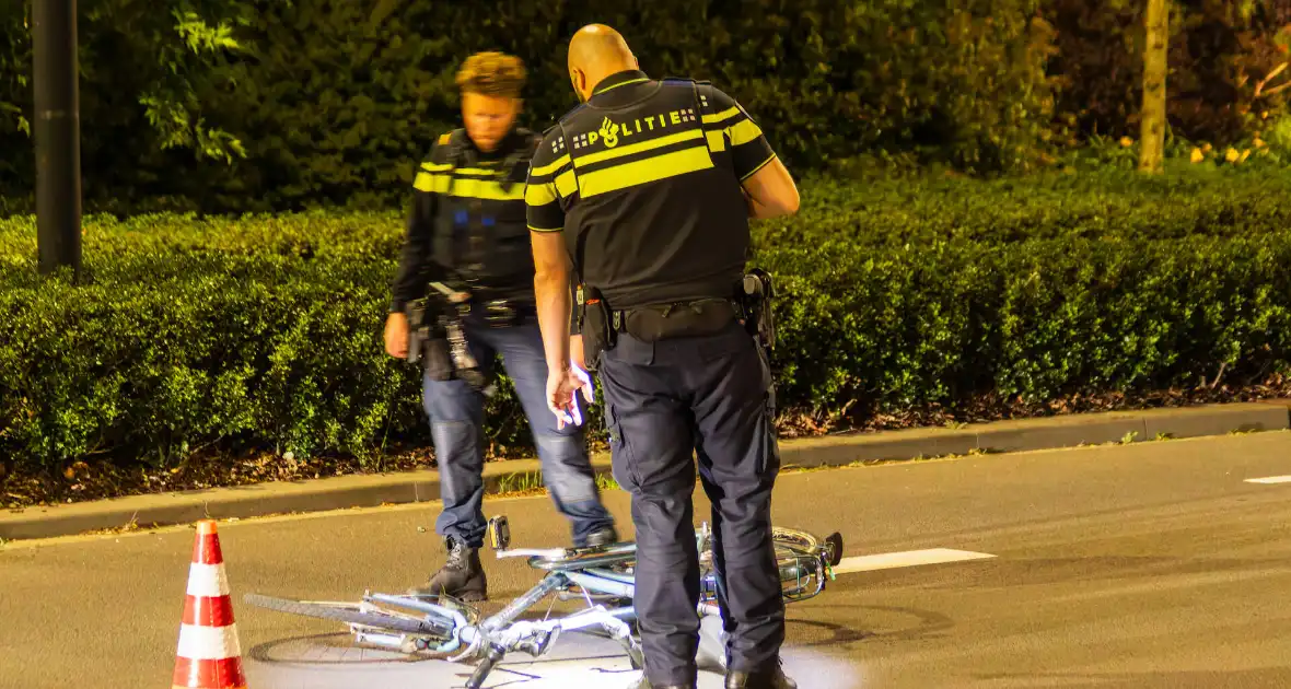 Politie schept fietser tijdens spoedrit - Foto 11