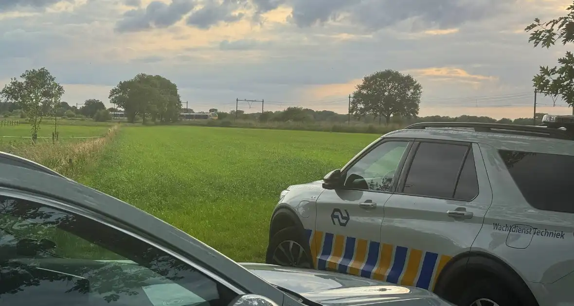 Botsing tussen trein en voertuig - Foto 1