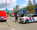 Zwaarbewapende agenten beveiligen drugslab