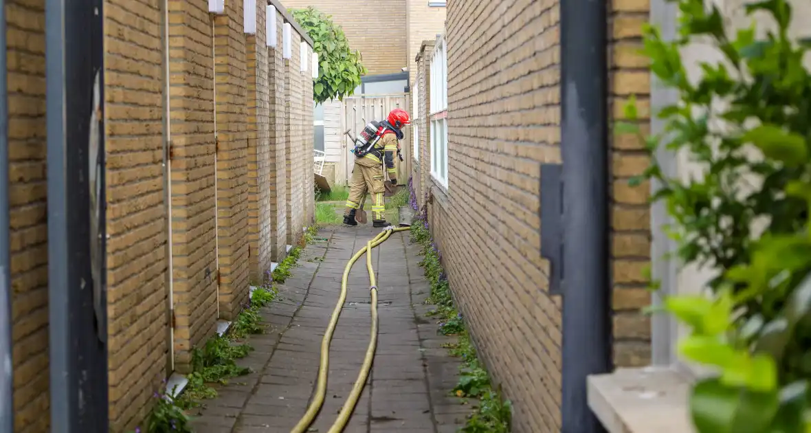 Brand in tuinschuur geblust zonder gewonden - Foto 4