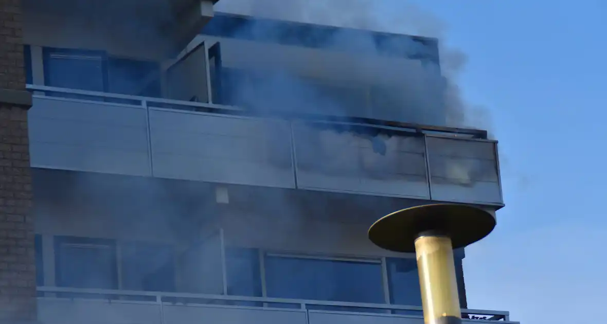 Appartementencomplex ontruimd door brand - Foto 1