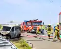 Brand in bestelbus na aanrijding met vrachtauto