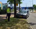 Automobilist botst op boom met letsel als gevolg