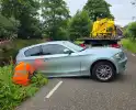 BMW bijna in water door fileontwijking