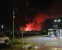 Uitslaande brand in bedrijfspand brandweer schaalt groots op