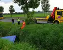 Berger trekt auto uit sloot
