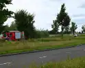 Voertuig op kant na ongeval