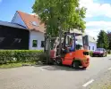 Heftruck gaat in vlammen op