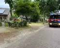 Houten schuurtje in brand