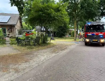 Houten schuurtje in brand