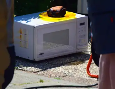 Brandmelding in woning blijkt aangebrand eten in magnetron