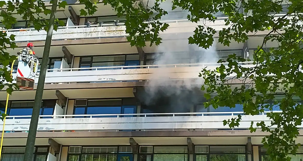 Bewoners ontkomen aan brand - Foto 1