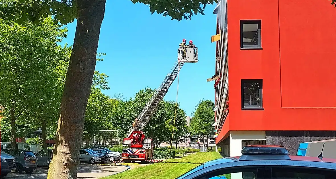 Bewoners ontkomen aan brand - Foto 6