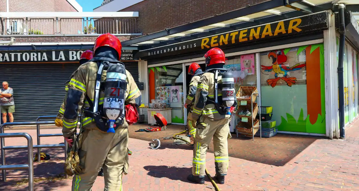 Brand in dierenwinkel snel geblust - Foto 5