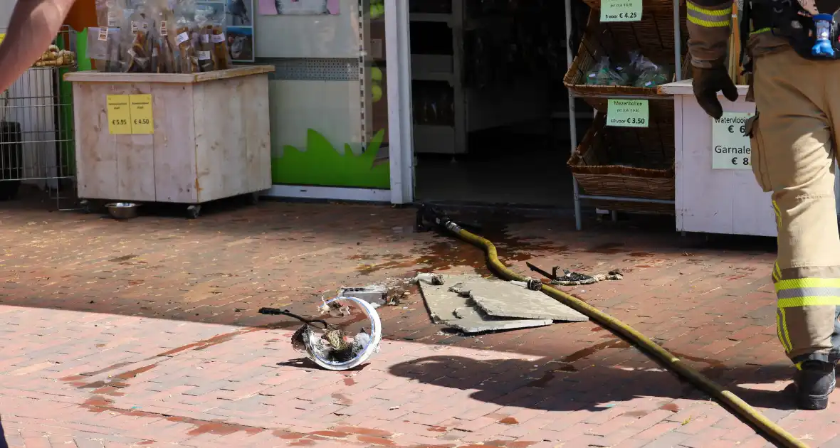 Brand in dierenwinkel snel geblust - Foto 6