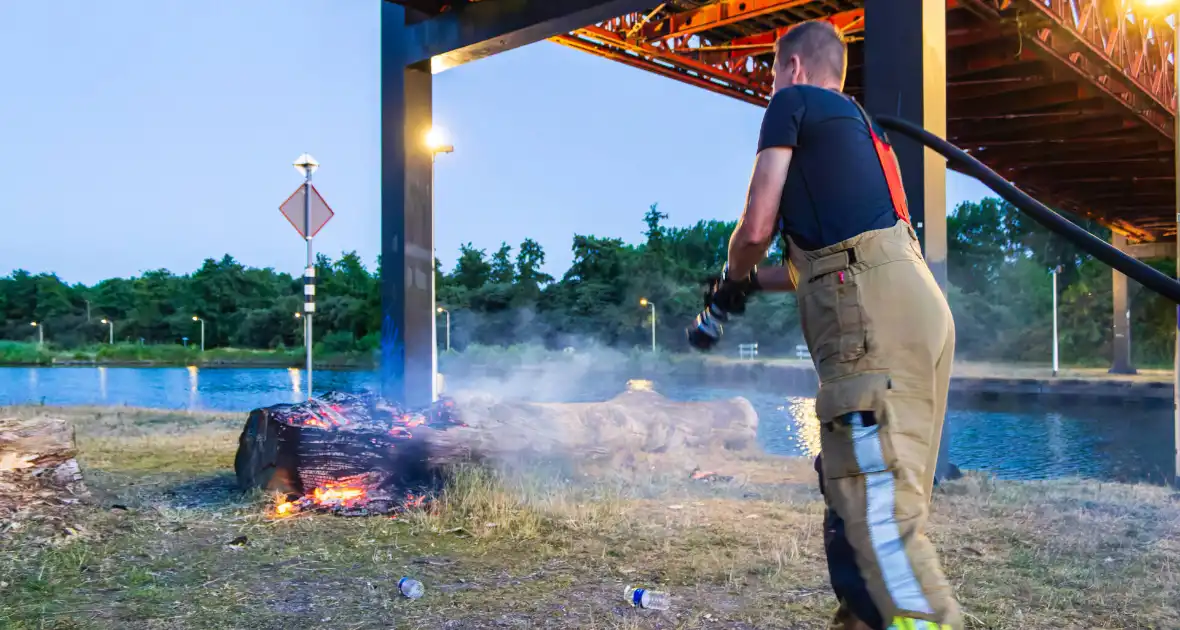 Mogelijke brandstichting bij boomstronk - Foto 8