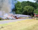 Hooi in brand, rookontwikkeling zichtbaar