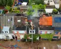 Brandweer schaalt op bij brand op dak